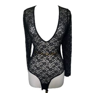 Woman’s Lace Bodysuit Size M